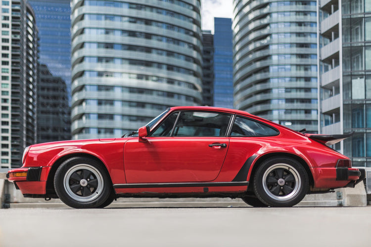 A red automobile car