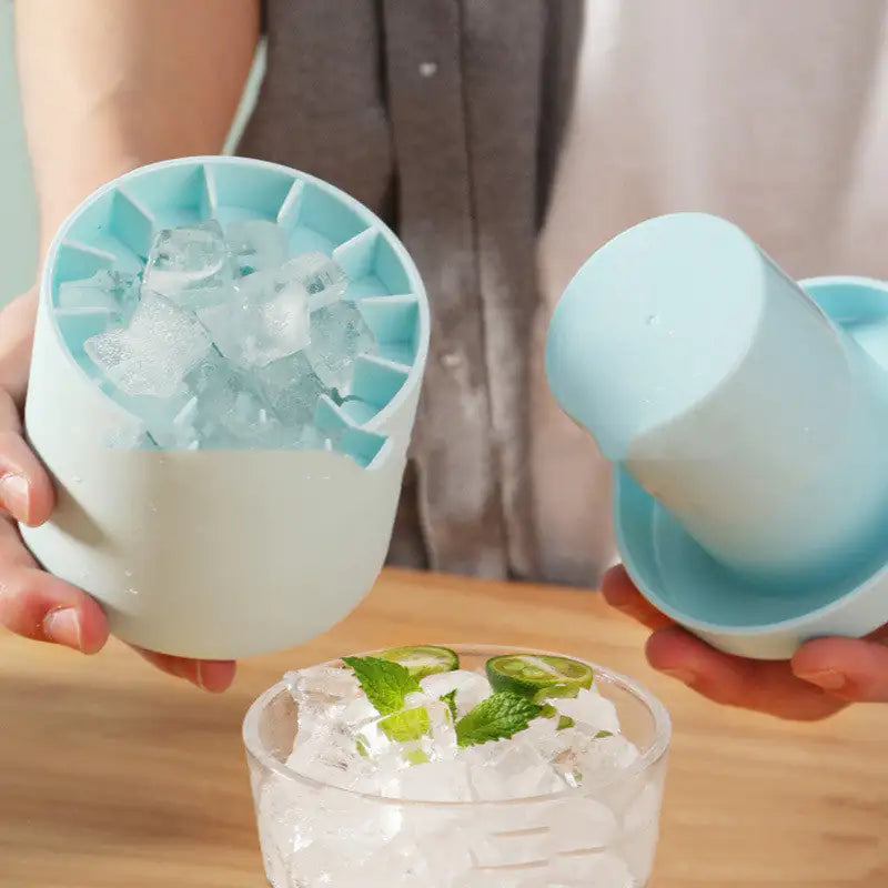 man holding Cylinder Ice Cube Mold full of ice