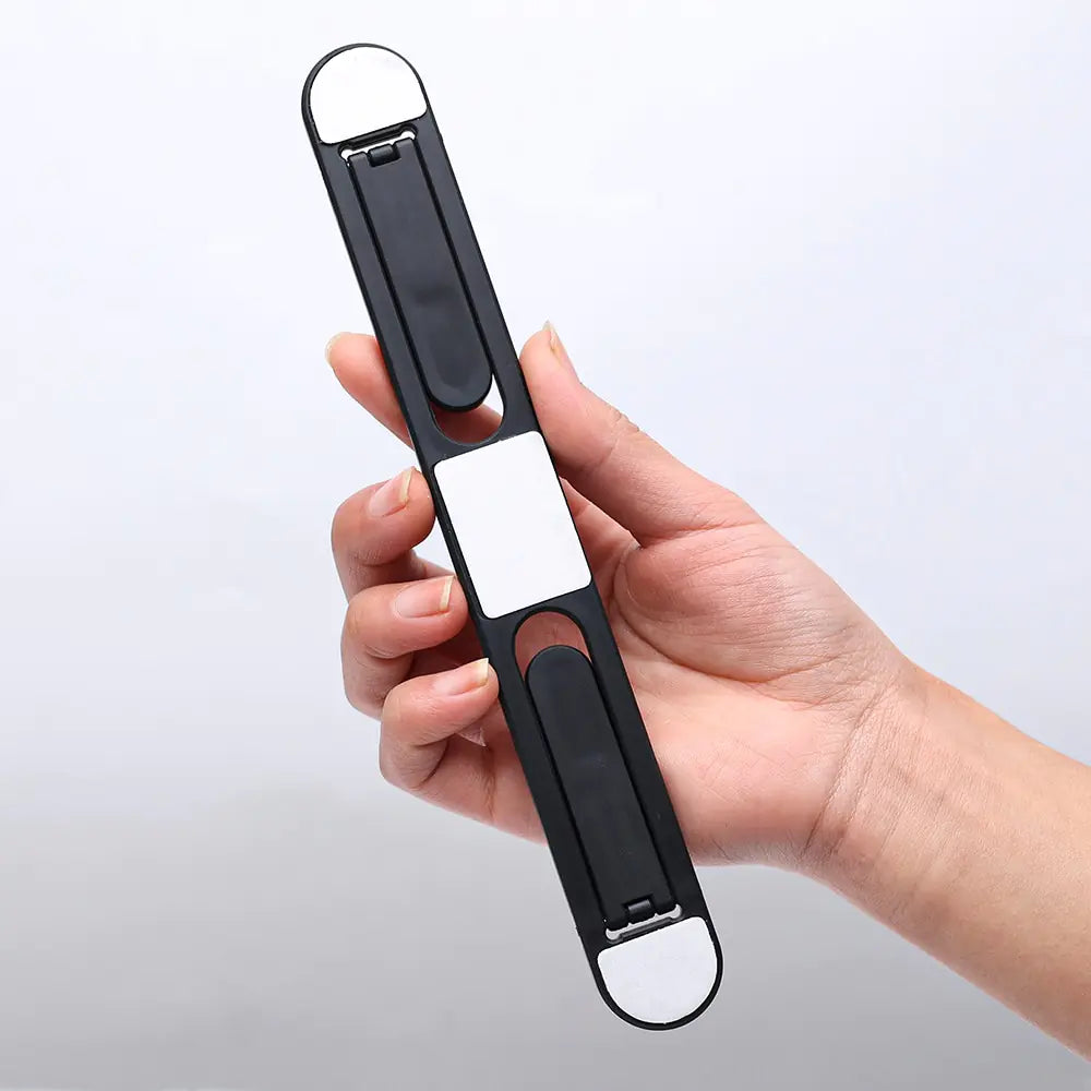 person holding the Ergonomic Laptop Stand