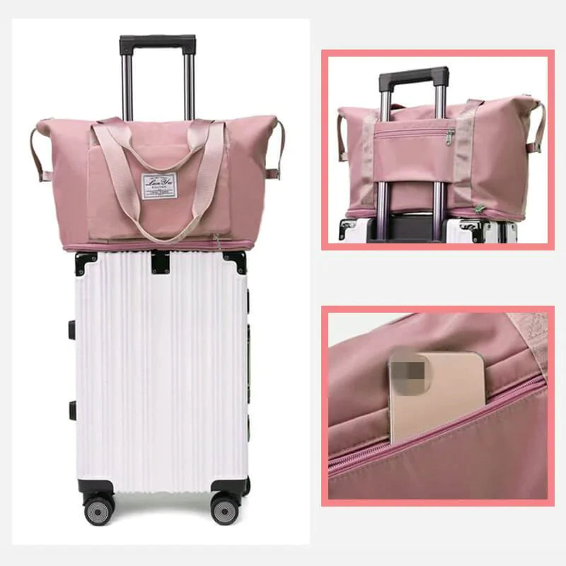Foldable Waterproof Travel Bag hanging on a suitcase handle