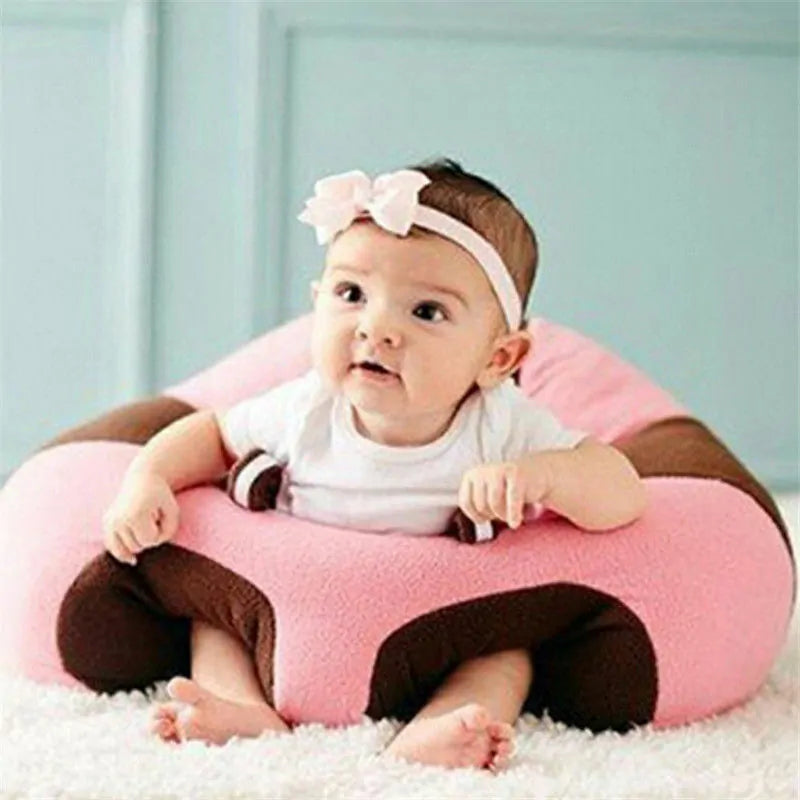 baby girl in a Plush Baby Support Seat