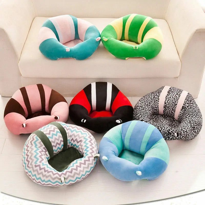 Plush Baby Support Seats on the couch and floor