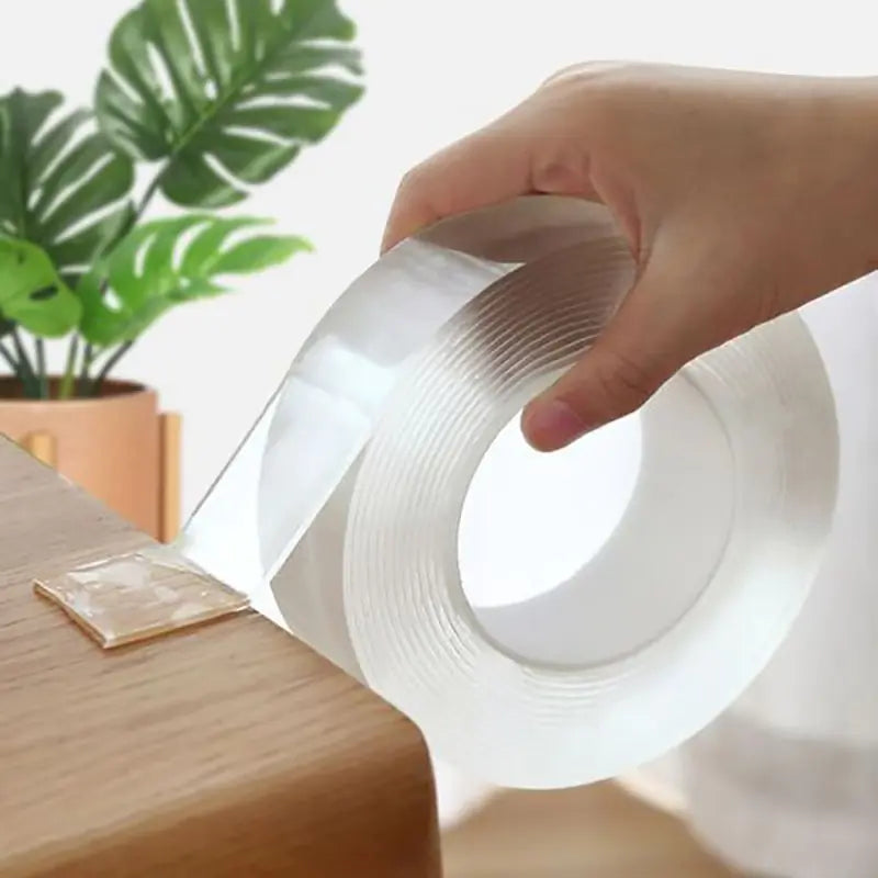 person unravelling Nano Double Sided Tape