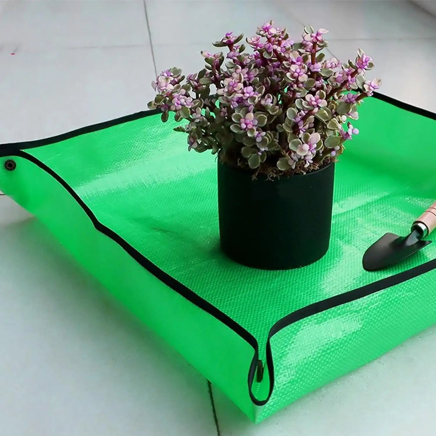 Waterproof Gardening Mat with a plant and shovel