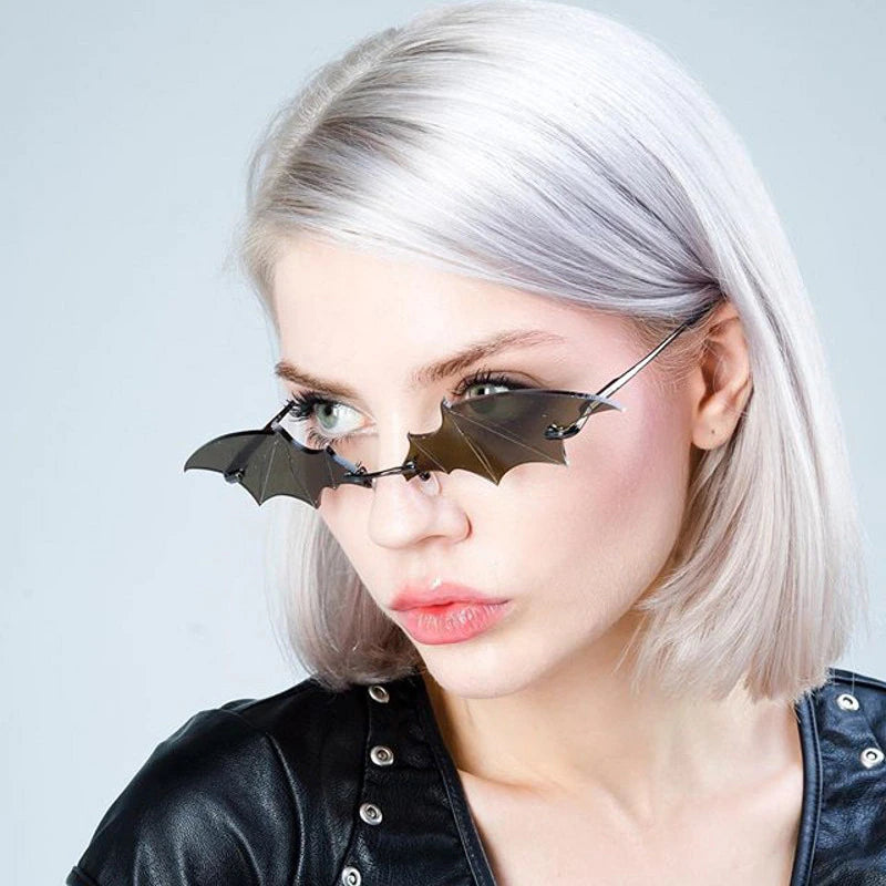 woman wearing Halloween Bat Sunglasses