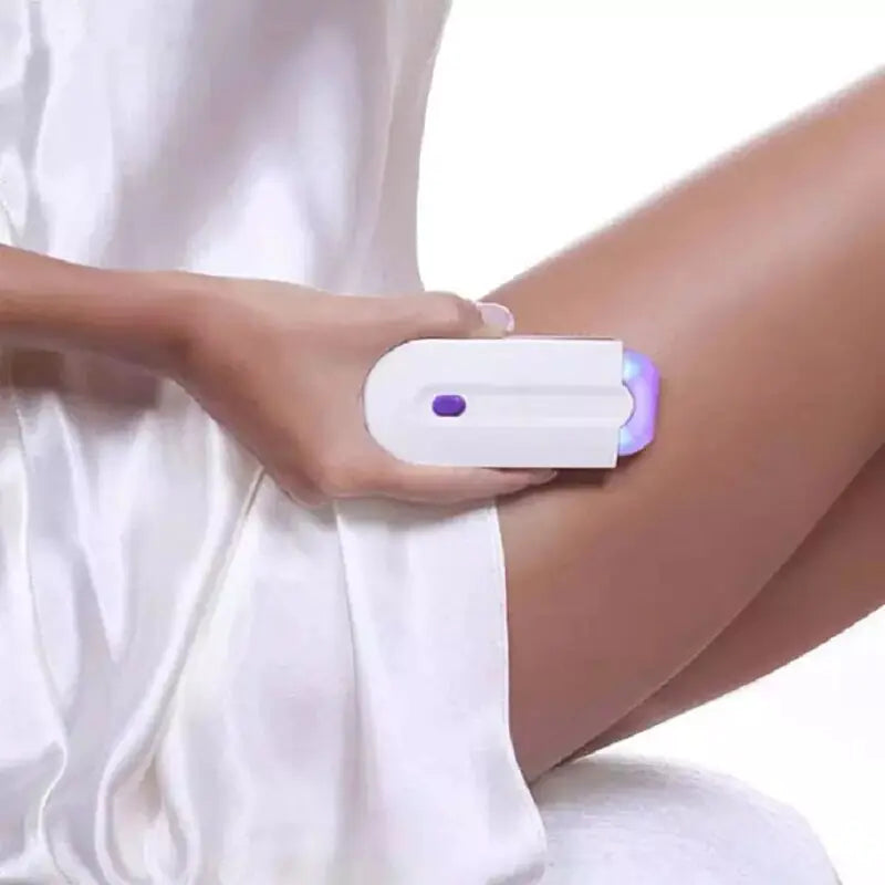 woman using the Mini Electric Epilator on her upper thigh