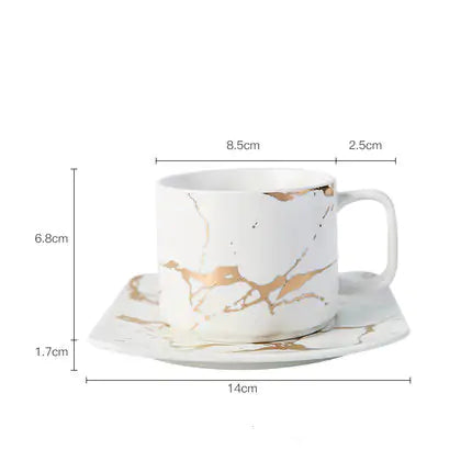 Tazas de café con incrustaciones de mármol dorado