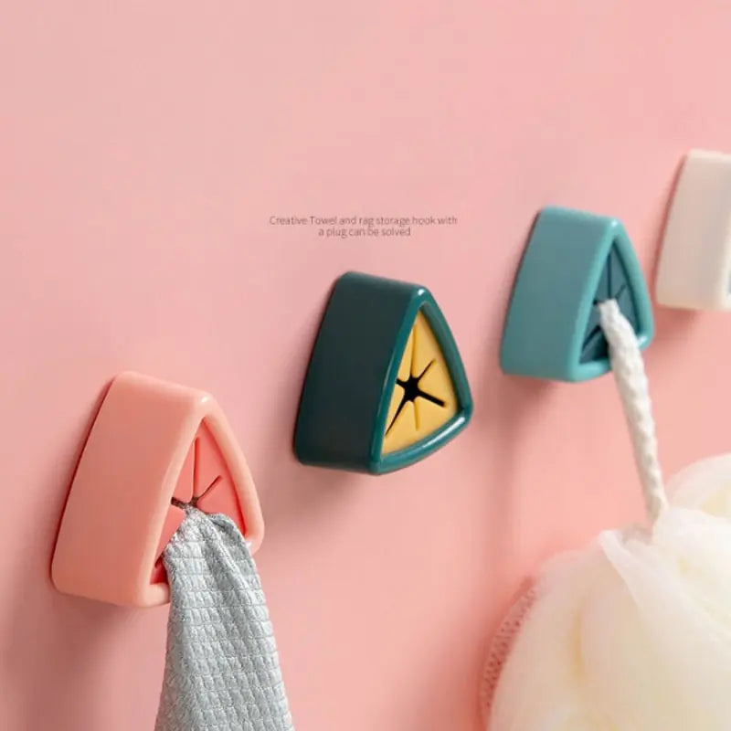 Wall Mount Towel Holders on a pink wall