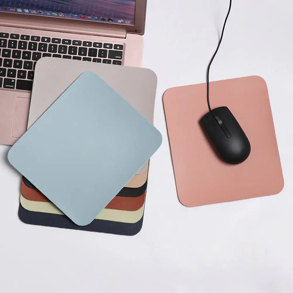 mouse resting on a Waterproof Desk Mousepad