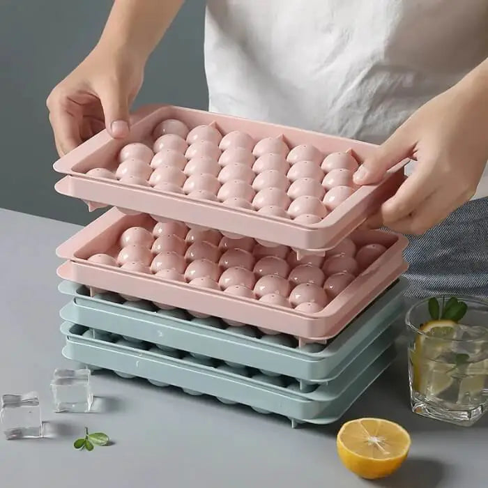 person stacking Round Ice Ball Molds