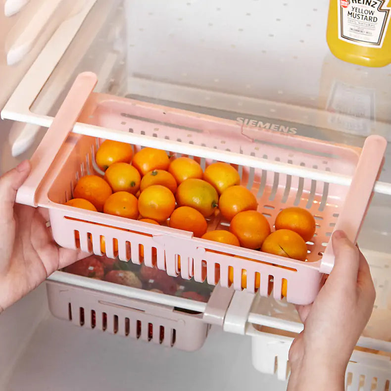 Refrigerator Storage Drawer being pushed into the refrigerator