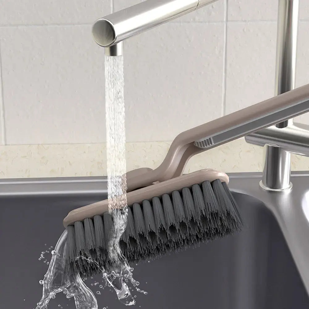 Rotating Crevice Cleaning Brush being rinsed off in the sink