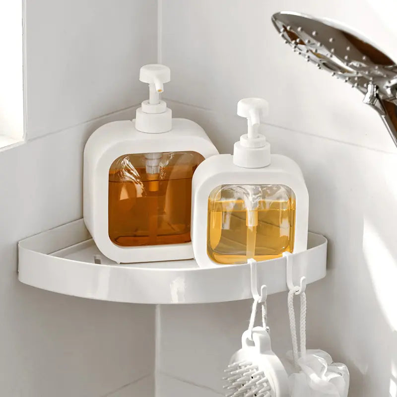 Refillable Soap Dispenser Bottles on a wall mounted display in the shower