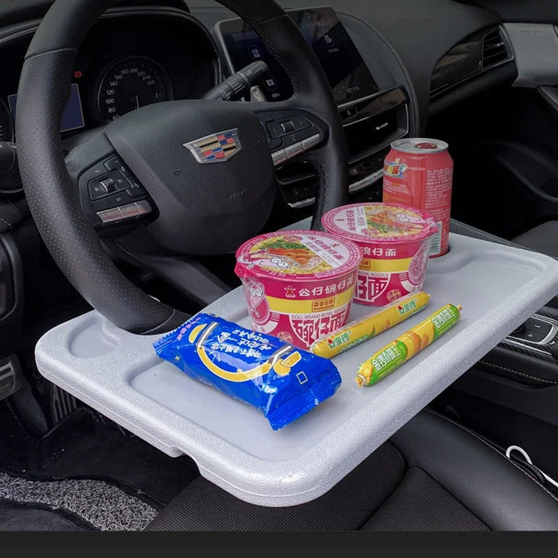 food resting on the Car Steering Wheel Tray
